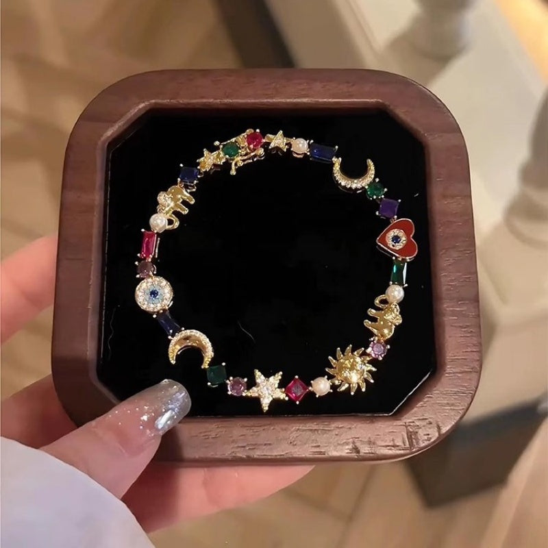 🌠Bracelet Charms Célestes ✅ Soleil, Lune & Cristaux | Élégant et Raffiné ✨ -50% AUJOURD’HUI 🔥