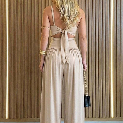 👗 Combinaison sans manches à jambes larges et découpes, avec nouage réglable dans le dos – Séduisante, fluide, sophistiquée 🌴