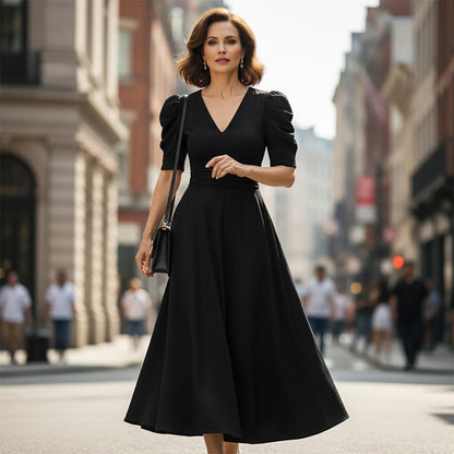 Robe élégante à col en V et taille haute avec manches bouffantes