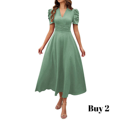 Robe élégante à col en V et taille haute avec manches bouffantes